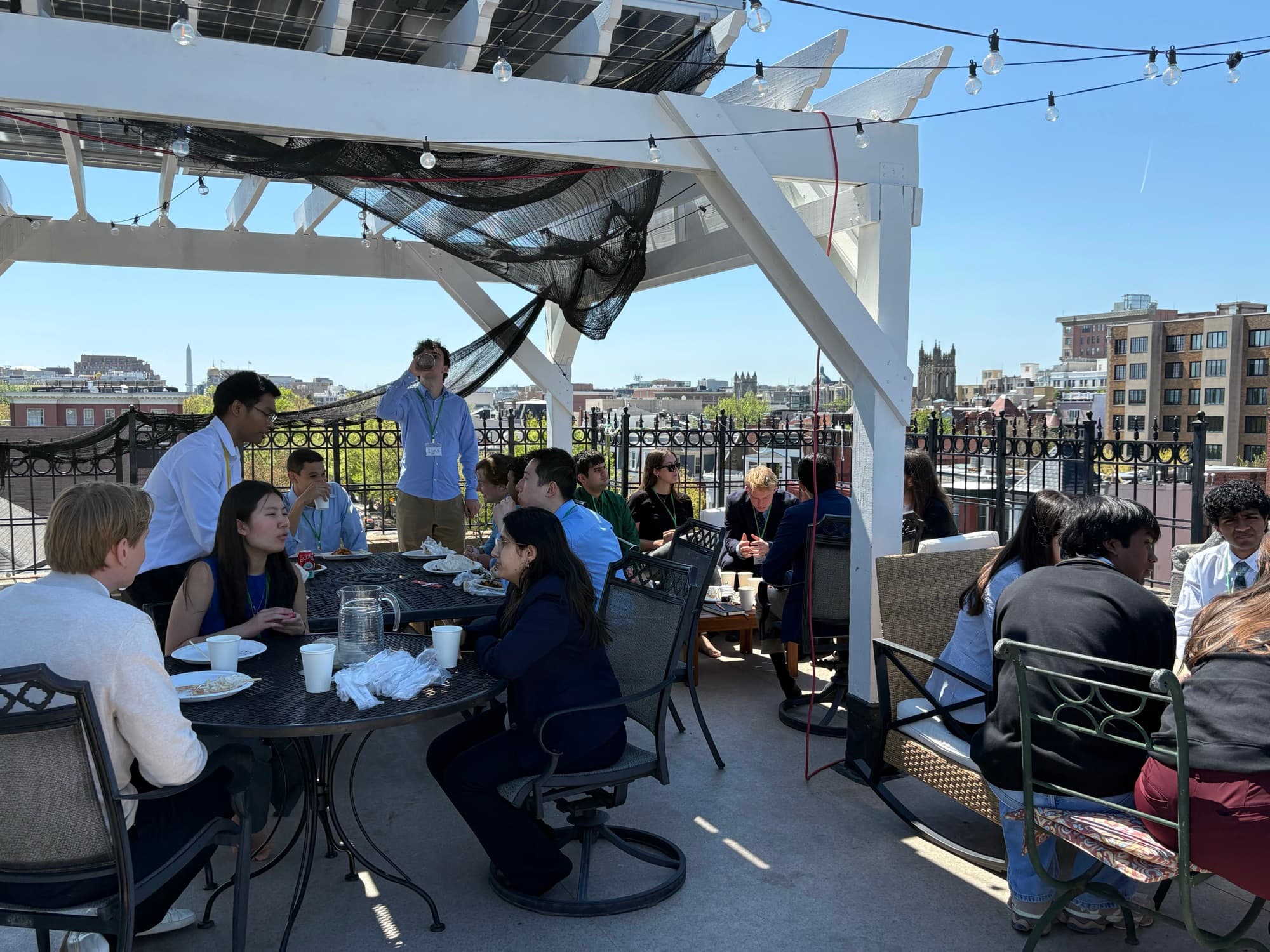 Attendees at lunch on a DC rooftop during DCMC 1.0